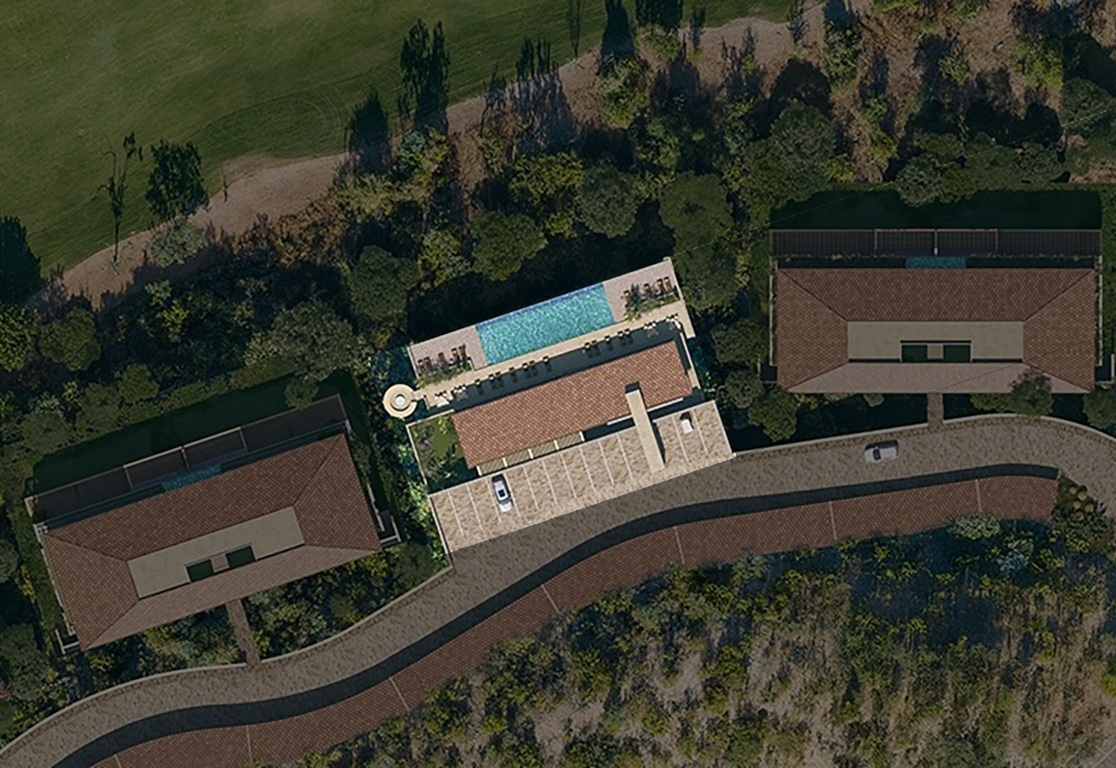 Aerial site plan view of the Mountain Residences amenity at Palmilla Reserve, featuring a central clubhouse with an outdoor pool, surrounded by residences, landscaped greenery, and a winding hillside road beside the golf course.