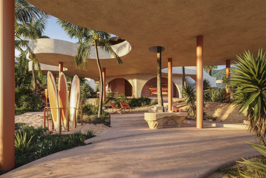 Tropical resort space with curved architecture, palm trees, surfboards, lounge seating, and lush landscaping.